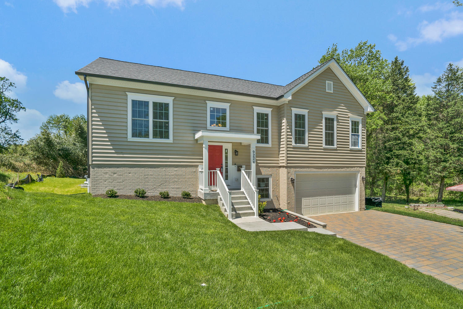Newly constructed home exterior with finished deck